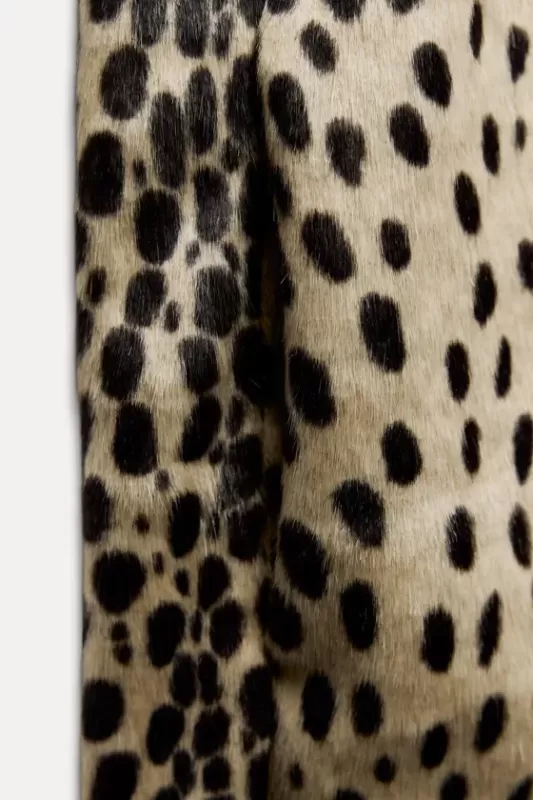 Faux fur jacket with animalistic print