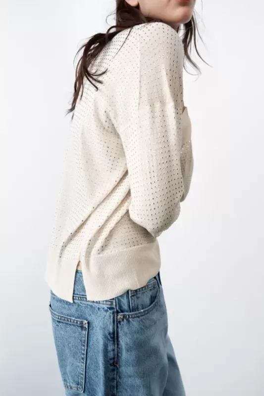 Knitted sweater with rhinestones