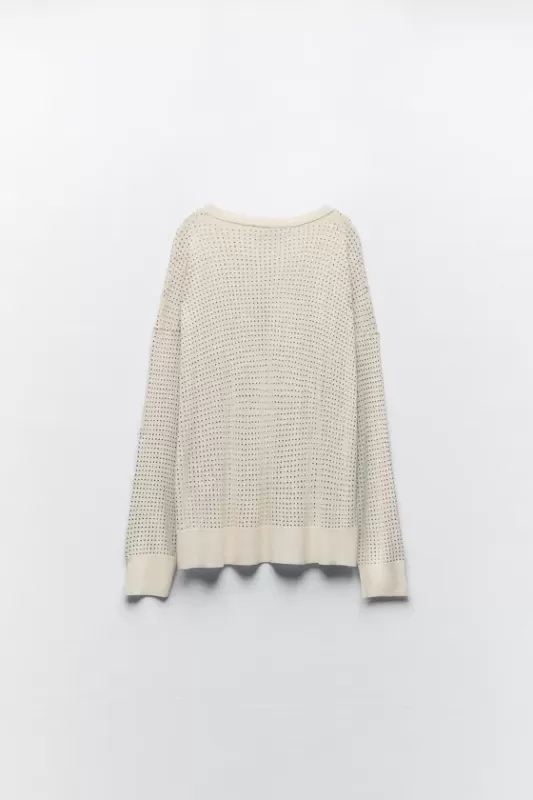 Knitted sweater with rhinestones