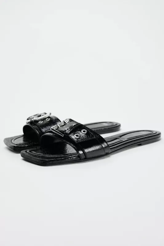 Sandals with buckles