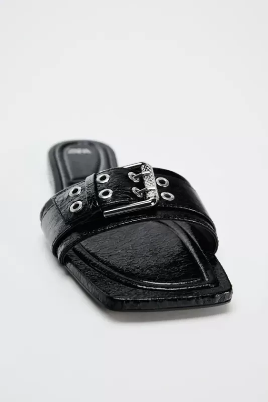 Sandals with buckles