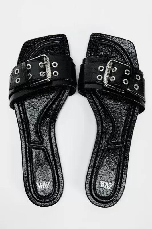 Sandals with buckles