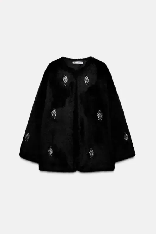 Faux fur coat with rhinestones