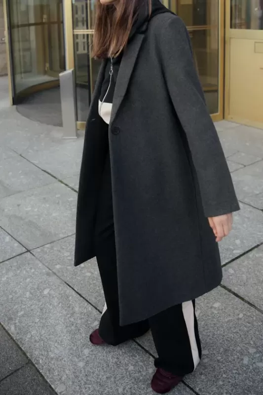 Coat made of soft fabric with buttons