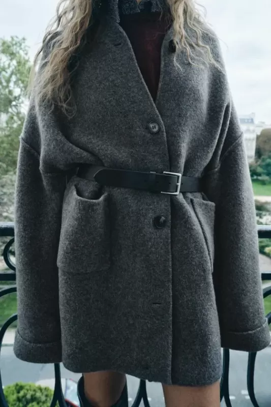 Knitted coat with patch pockets