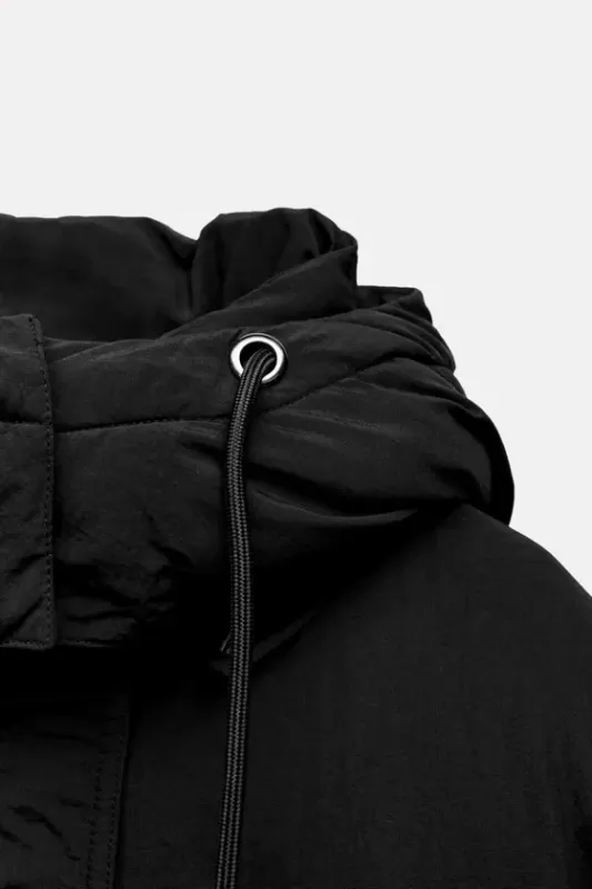 Long quilted anorak with hood