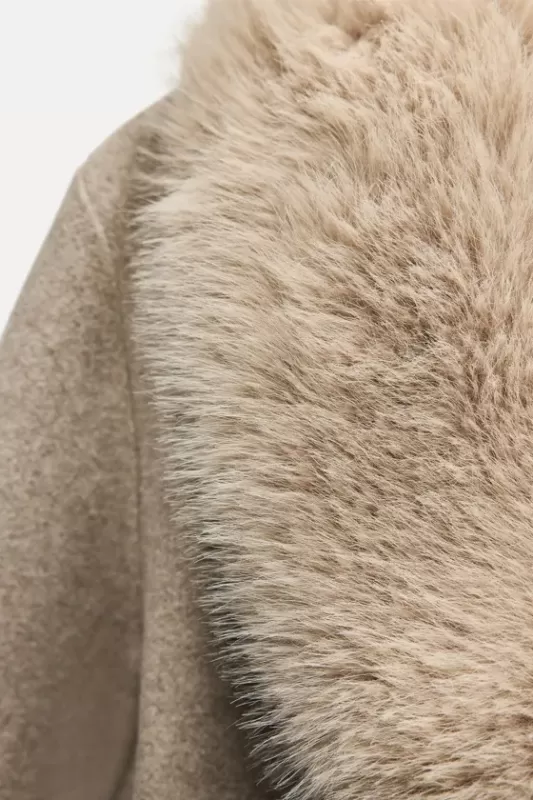 Coat with faux fur collar