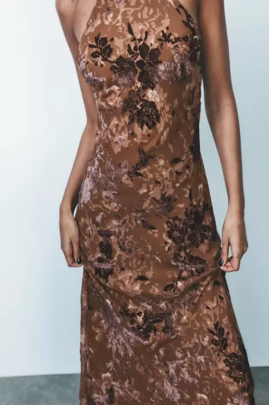 Dress with velvet floral pattern and halter neck