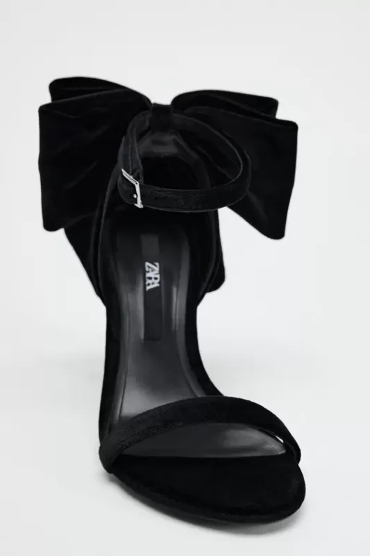 High heel sandals with big bows