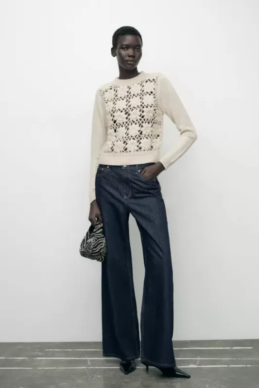 Crochet lace sweater with contrasting pattern