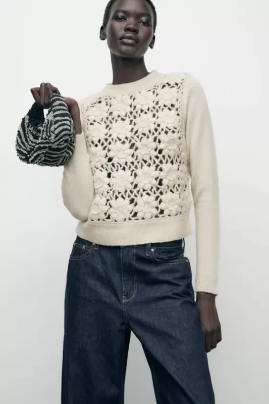 Crochet lace sweater with contrasting pattern